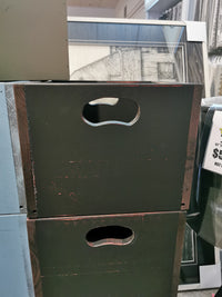 Two Mercana SB101 Record Crates in black wood fit vinyls, stacked against art piece backdrops.