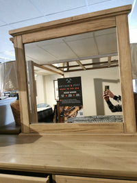 Rustic charm: The 176 Cool Rustic Dresser by Vaughan Bassett is crafted from solid oak and features a large mirror.