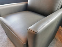 A close-up of the 733 Leather Swivel Chair by Leather Craft—custom leather furniture in Toronto.
