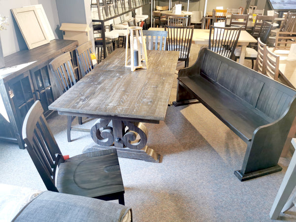 The Magnussen 2491 Bellamy Dining Package: classic pine table with ornate legs, matching chairs, and bench.