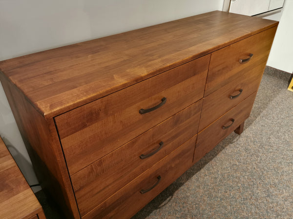 The Rocklynd Dresser by Vokes is a Canadian hardwood 6-drawer dresser with metal handles for modern bedrooms.