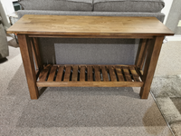 The NP100S Newport Sofa Table by Winners Only features a distressed finish and slatted shelf, perfect behind your sofa.