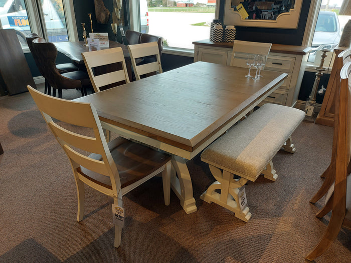 The Magnussen D5164 Hutcheson 6 Piece Dining Set features a two-tone table, chairs, and a cushioned bench on carpet.