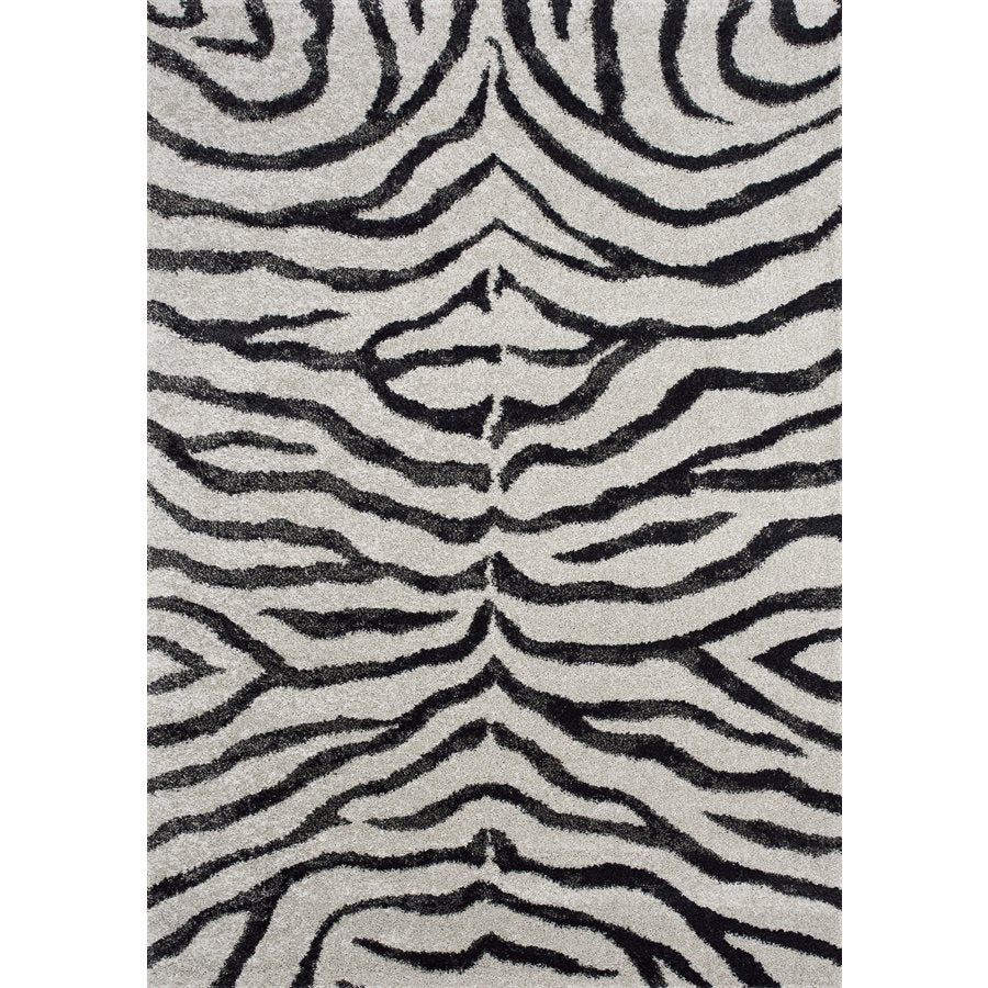 The Kalora Sable 9652/P384 rug features a bold vertical black and white zebra pattern for a chic, modern look.