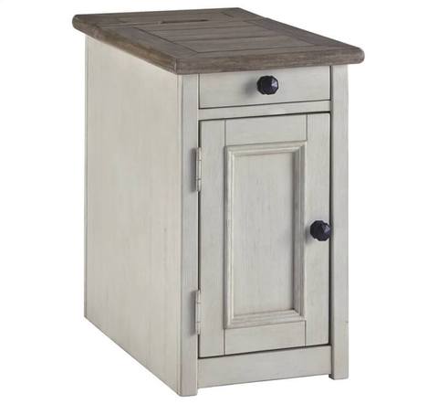 The Ashley Bolanburg Chairside Cabinet features a drawer, cabinet, and vintage two-tone gray and brown finish.
