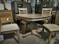 The Winners Only Ventura Pedestal Table set includes a round solid hardwood table and four chairs in grey washed finish.