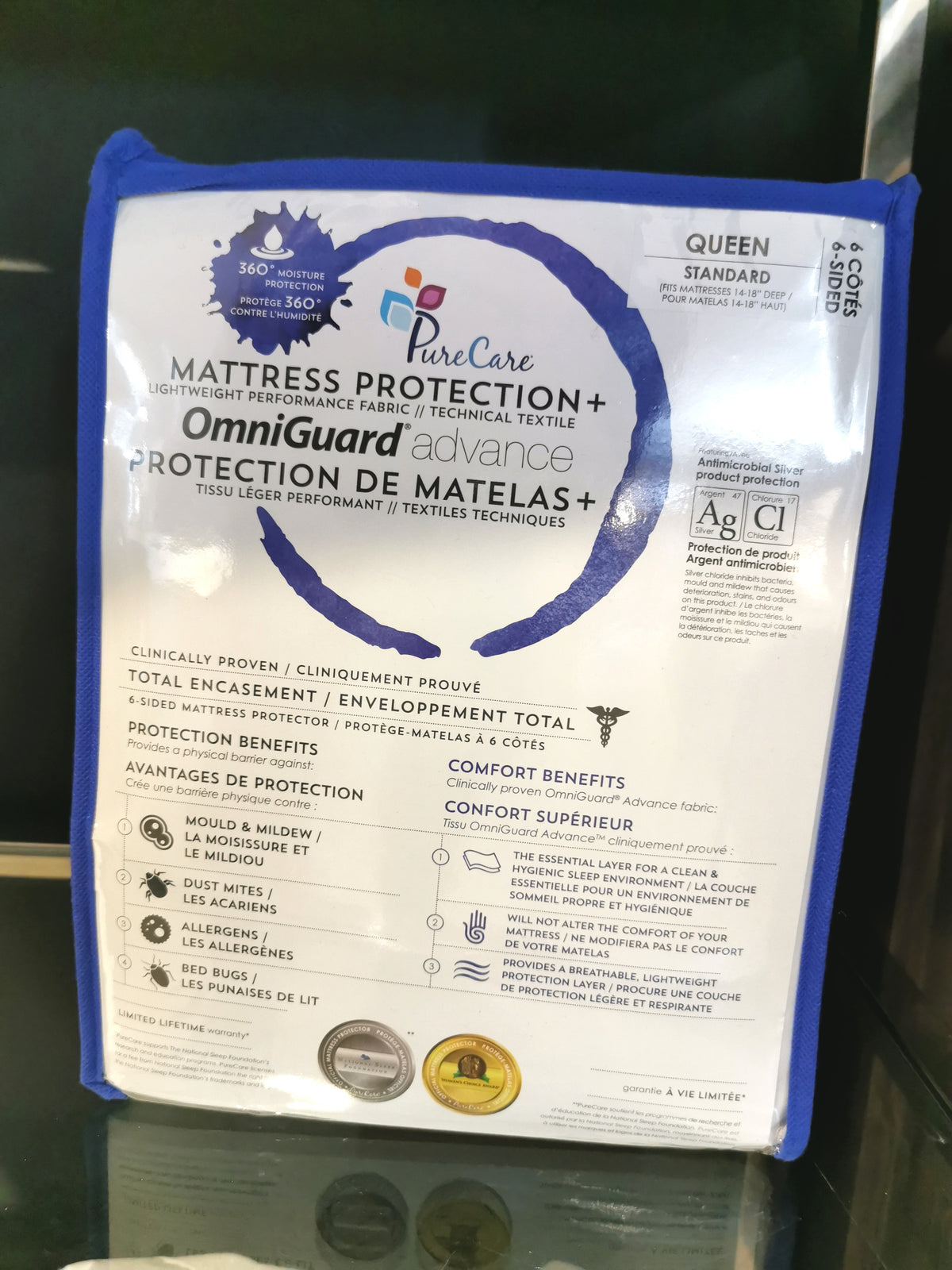 Zucora Home Cotton Terry Omni-Guard Protector, queen size, listed in English and French with antimicrobial protection.