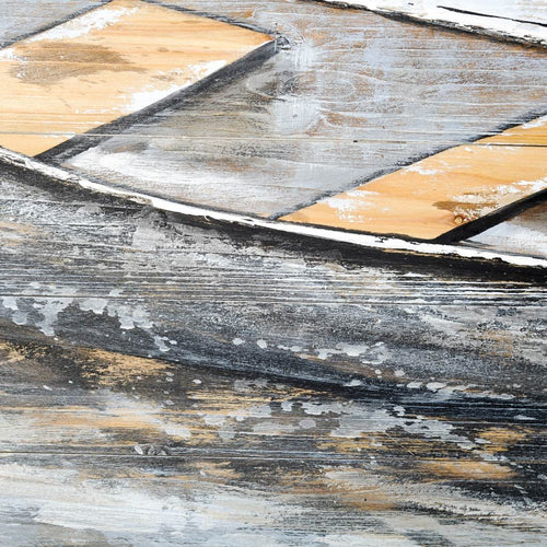 Close-up of textured, weathered wood featuring diagonal beige and dark gray patterns on a rustic surface, evocative of hand-painted wood panels from Mercana's 40596 Creekside Boats collection.
