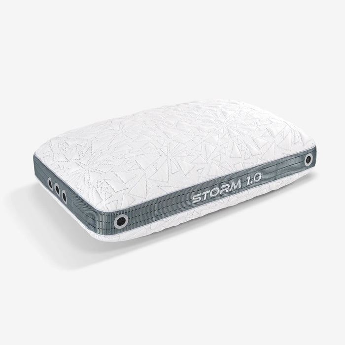 A rectangular white Storm Cooling Pillow by Bed Gear with geometric patterns and "STORM 1.0" on the grey side panel.