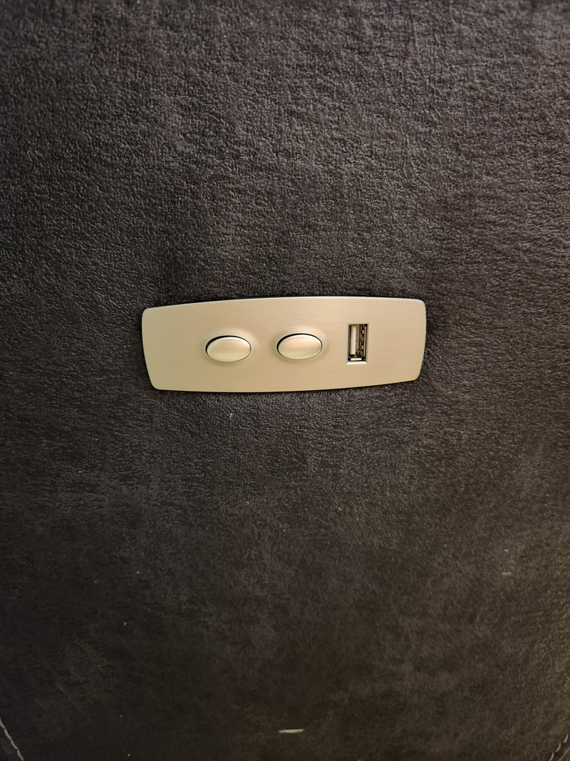 A beige panel with two buttons and a USB port, ideal for your La-z-boy 724 Trouper Power Console Reclining Loveseat.