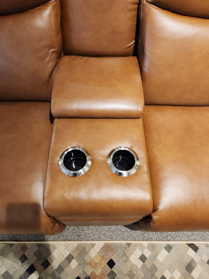 The 781 Emmons Power Reclining Console Loveseat by La-Z-Boy adds comfort and style with its brown leather finish.