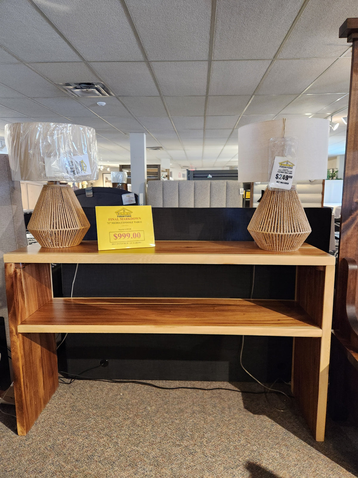 Heft's 71" Media Console Table is perfect with two wicker lamps in an entertainment space.