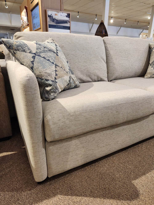 The Superstyle 9351 Queen Sofa Bed with fiber-filled pillows adds comfort and style to any space.