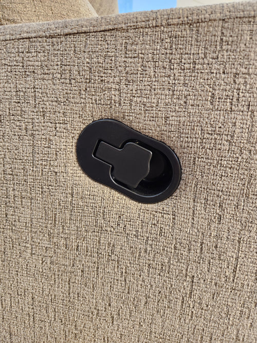Close-up of a black recliner handle on the Palliser 41049 Oakwood Manual Chair Wallhugger in beige textured fabric.