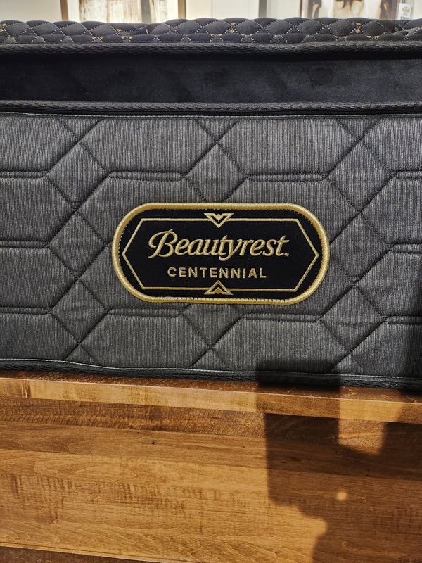 A close-up of a Beauty-rest Hermes Ultra Plush Mattress with quilted pattern, logo label, and micro coils.