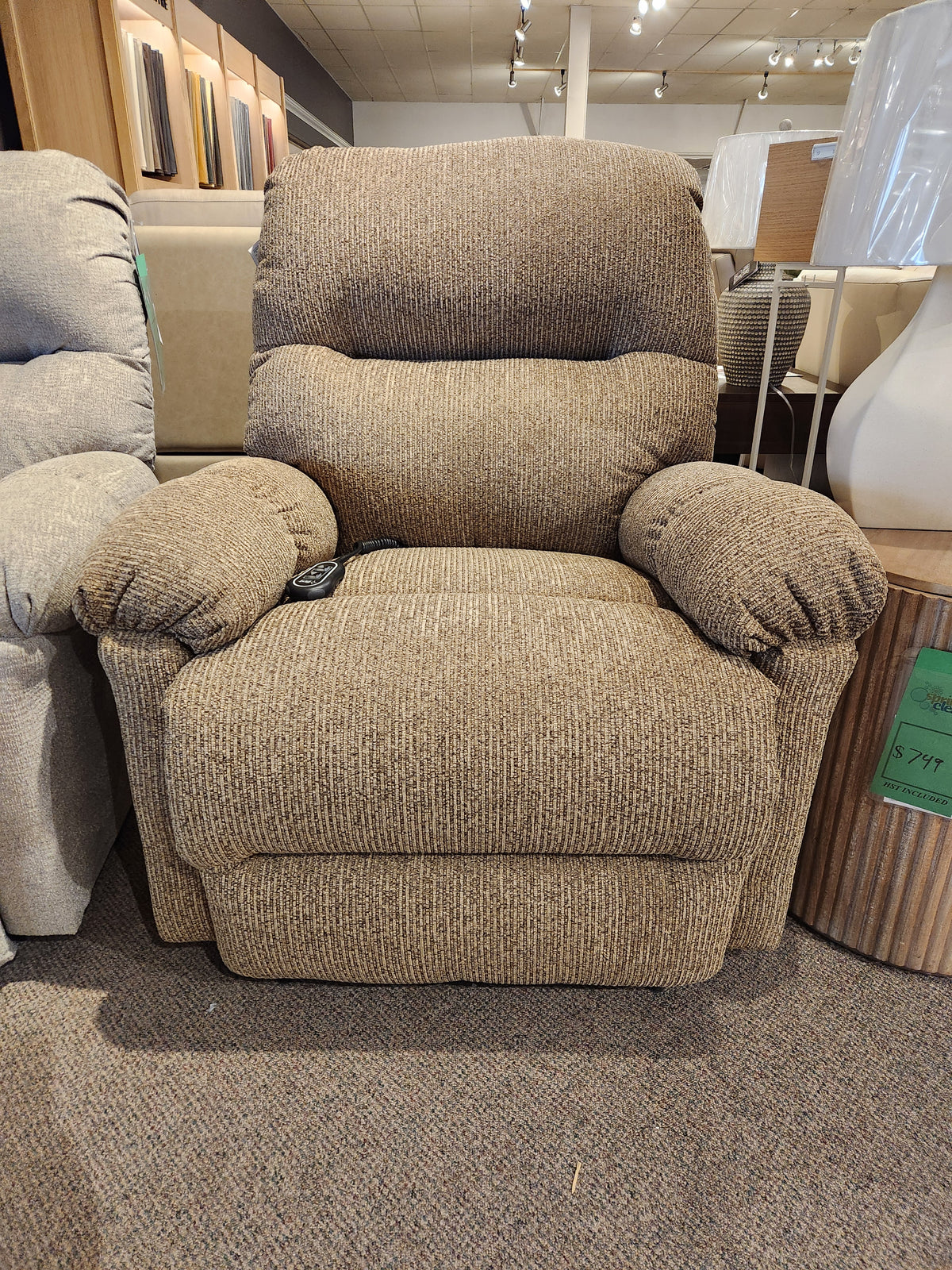 The Best 7MP84 Ellisport Power Space Saver Recliner brings comfort to a showroom of space-saving furniture.