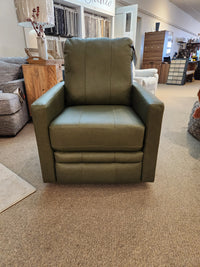 The Best Kristisha Swivel Push-back Recliner in green features a modern silhouette among other furnishings.