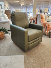 Best's Kristisha Swivel Push-back Recliner in green, featuring a triple back design, on display in the store.