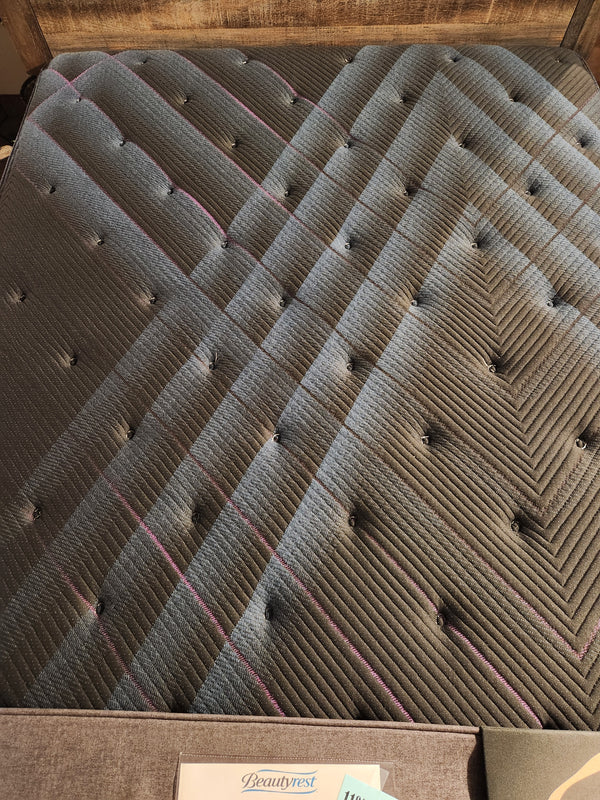 Close-up of the Beauty-rest ESME TT Medium Mattress with a chevron pattern and button tufts for restful sleep.