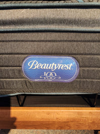 Beauty-rest Echo PT Medium Mattress label with "100 Years" emblem, featuring memory foam and pocket coil system.