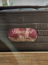 Close-up of a Beauty-rest Haven TT Firm Mattress label, showcasing comfort and quality for a restful night's sleep.
