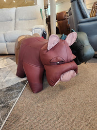 Reiner's Originals Reiner's Leather Animal Ottomans--Bulldog is displayed on a carpeted floor in a furniture store.