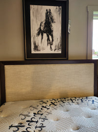 Magnussen B5907 Llewellyn Queen Upholstered Bed Frame in Merino Pearl with patterned mattress beneath horse art.