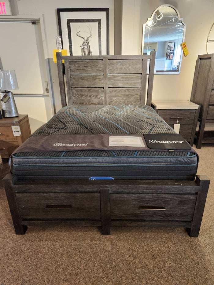 Magnussen Plum Creek B5990 Queen Bed in Ravenwood Black with storage drawers, bronze hardware, and matching nightstands.