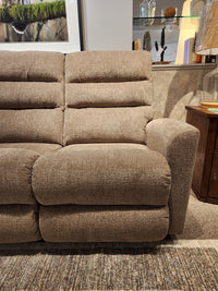 La-z-boy 786 Liam Power Reclining Sofa with adjustable legrests sits on a patterned rug by a wooden side table.