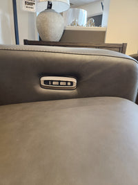 Close-up of La-z-boy 811 Acadia Power Reclining Sofa armrest with three buttons for customizable headrest support.