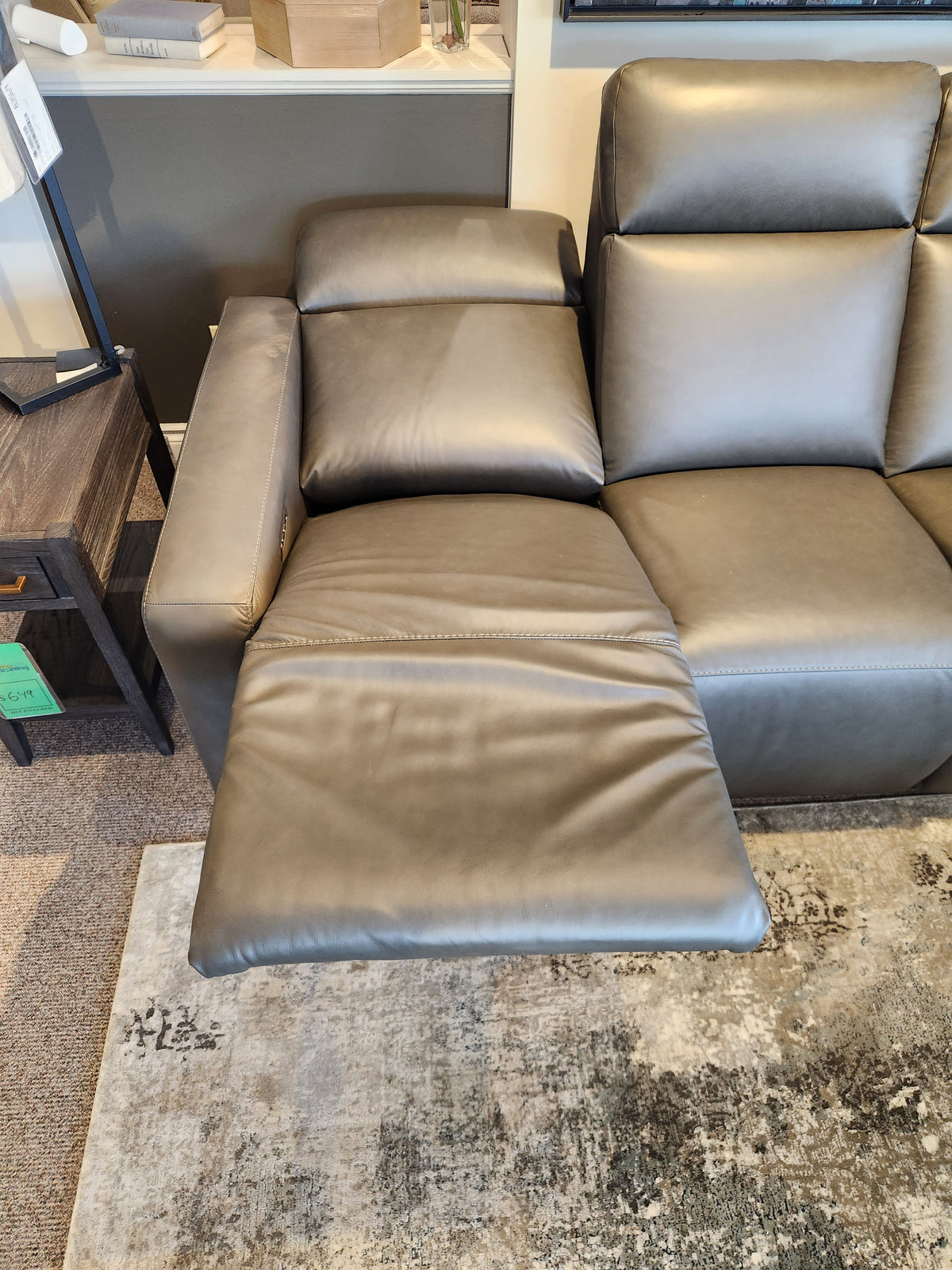 The La-z-boy 811 Acadia Power Reclining Sofa w/ Headrest & Zero Grav, left seat extended, on a patterned rug.