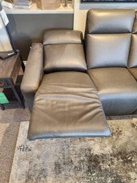 The La-z-boy 811 Acadia Power Reclining Sofa w/ Headrest & Zero Grav, left seat extended, on a patterned rug.