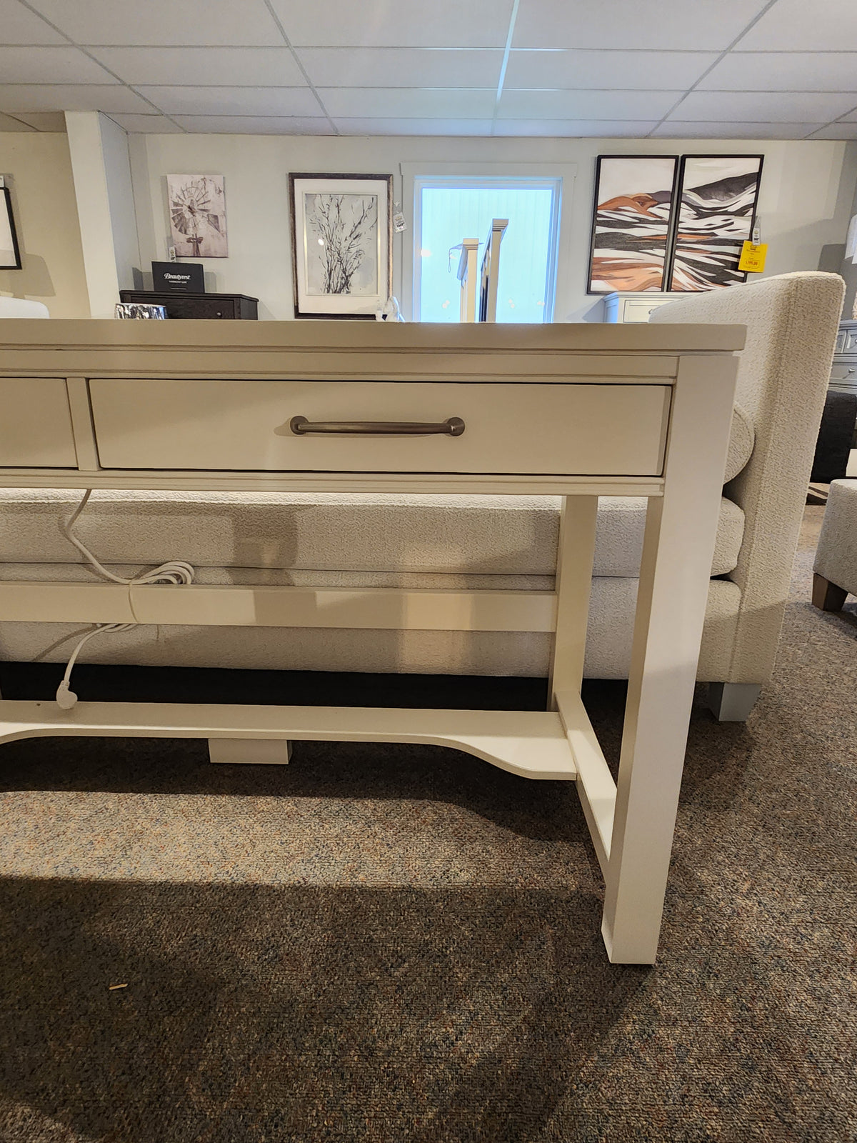 The 834 Laptop Desk by Ben & Erin Napier for Vaughan Bassett offers a drawer and is crafted from North American hardwood.