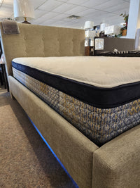 KingsDown Garland ET Plush Mattress on a beige bed frame with blue under-bed lighting for a cooler sleep environment.