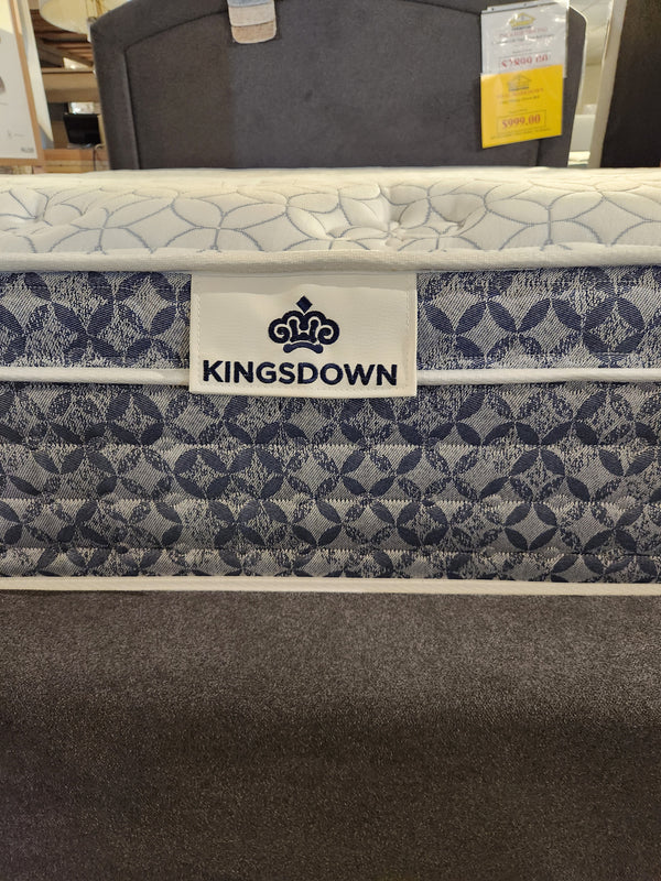 Close-up of KingsDown Paris 2 ET Plush Mattress with patterned fabric, plush comfort, and visible KingsDown label in store.