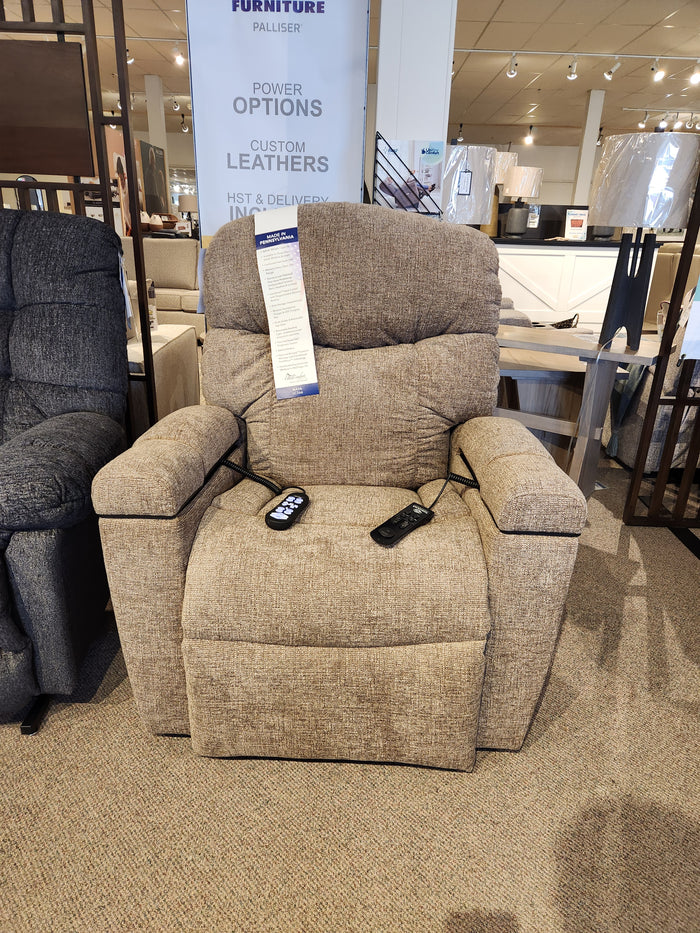 Golden Noah UC-566 Med Power Lift Chair in brown with two remotes and HeatWave tech, shown in a showroom.