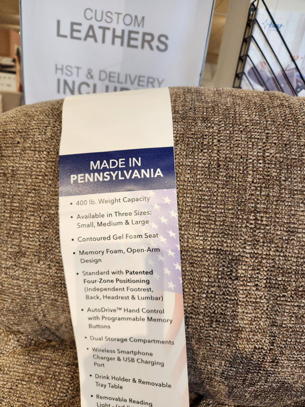 A tag on the Noah UC-566 Med Power Lift Chair by Golden lists features and says it’s made in Pennsylvania. Banner behind.