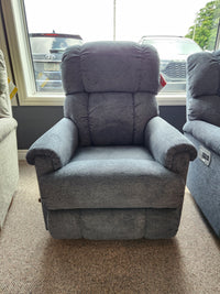 The La-z-boy 512 Pinnacle Rocker Recliner With Contour Cushion is shown indoors by a window with cars outside.