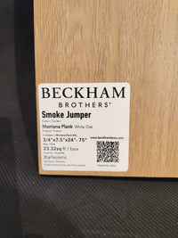 Label on wood sample reads "Beckham Brothers Montana Plank White Oak, 7.5"x24"-75", 23.32 sq ft/box.