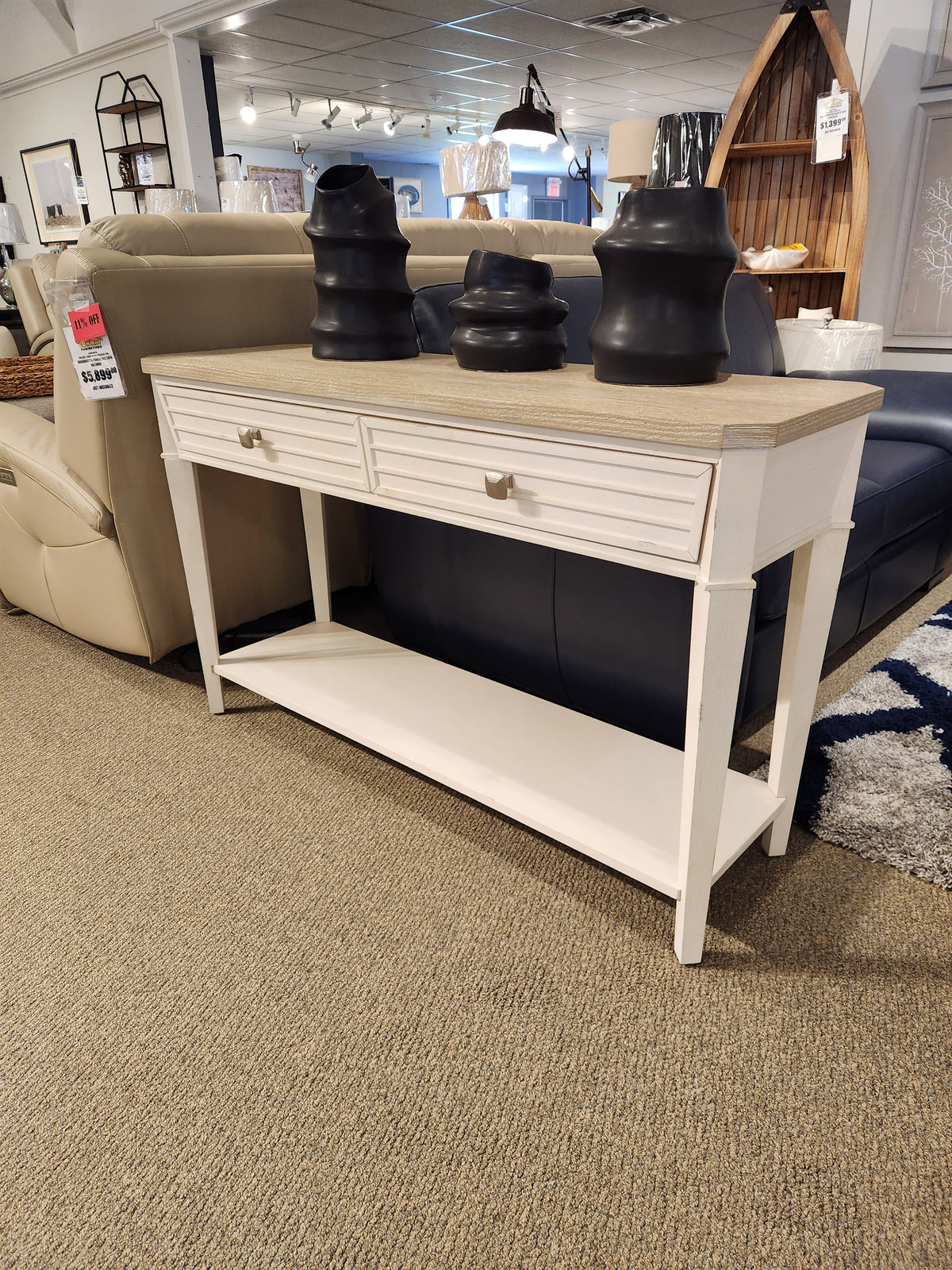 The Magnussen T6310-Echo Isles Sofa Table features drawers, quartered oak tops, and a lower shelf in a white finish.