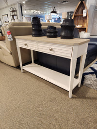 The Magnussen T6310-Echo Isles Sofa Table features drawers, quartered oak tops, and a lower shelf in a white finish.