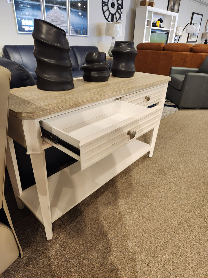 The Magnussen T6310-Echo Isles Sofa Table features a white wood base and quartered oak top for transitional casual style.