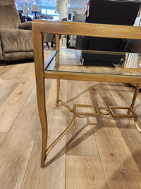 The Magnussen T6300 Lorena End Table features gold metal and glass with a burnished brass finish for classic appeal.