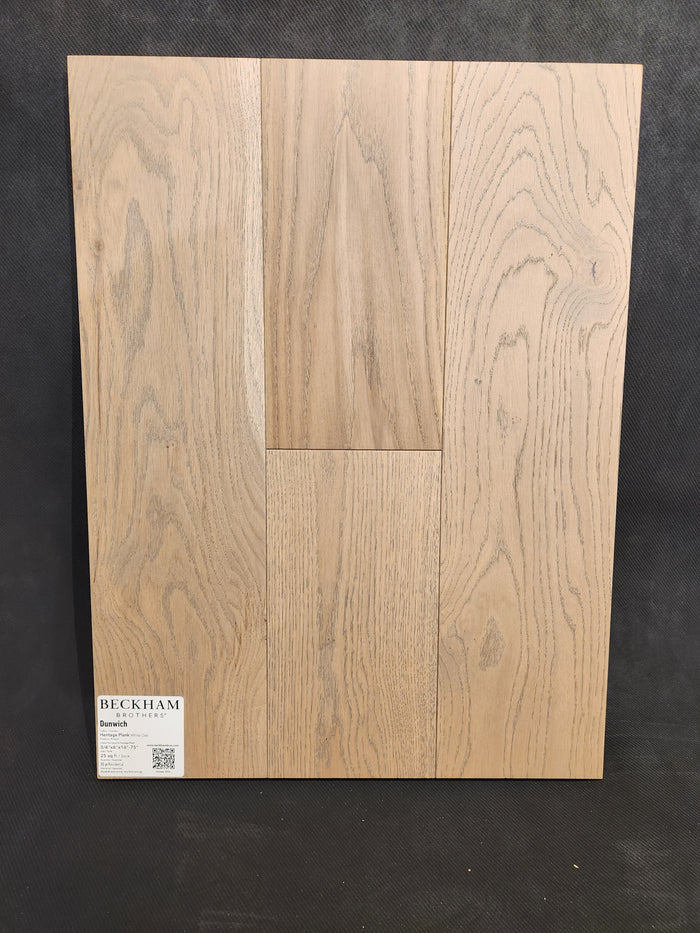 A sample board of Beckham Brothers Heritage Plank White Oak flooring shows visible grain patterns, labeled in the corner.