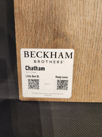 A sample of Beckham Brothers Hang Loose Luxury Vinyl (Glue-Down Plank) on a textured surface.
