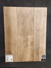 A sample panel of Beckham Brothers Little Ben XL Luxury Vinyl Click Plank with quality and 9X Coating certification logos.