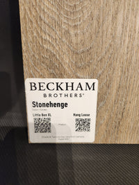 Label on wood-textured panel reads "Beckham Brothers Hang Loose Luxury Vinyl (Glue-Down Plank)" with QR codes.