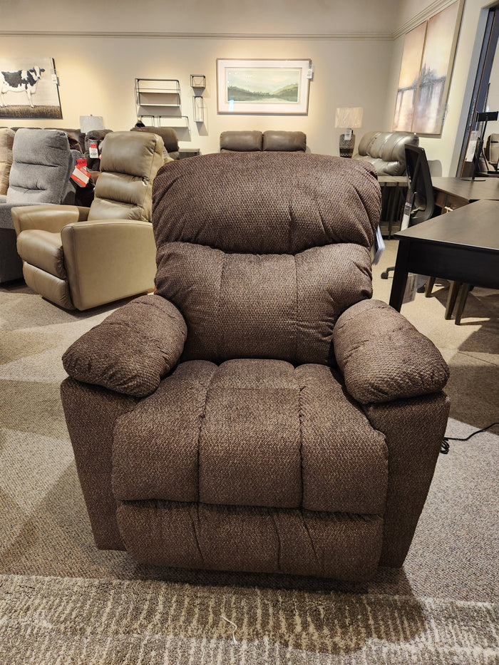 The La-z-boy 766 Morrison Power XR Recliner is showcased in a showroom with other chairs in the background.