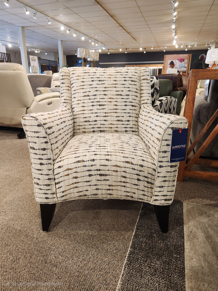 Superstyle 341 Accent Chair with patterned fabric and espresso legs displayed in a furniture showroom.