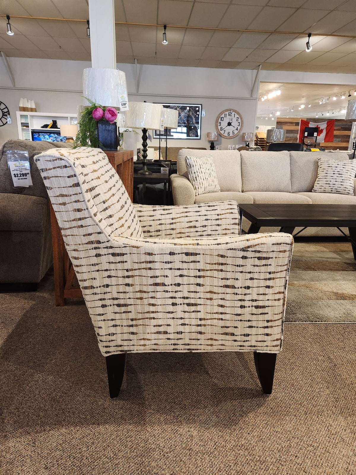 The Superstyle 341 Accent Chair features patterned fabric and espresso legs, adding style to any living space.